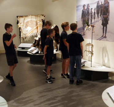 Group of school children in a museum gallery