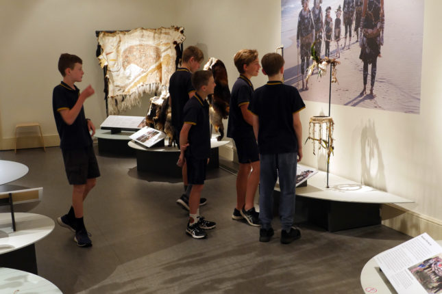Group of school children in a museum gallery