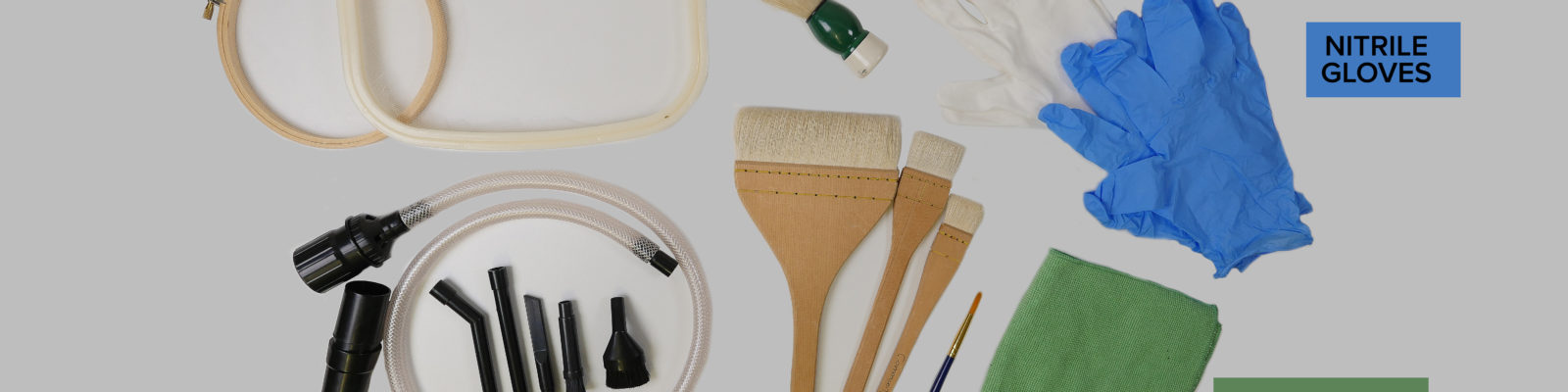 Selection of cleaning tools layed out on a table.