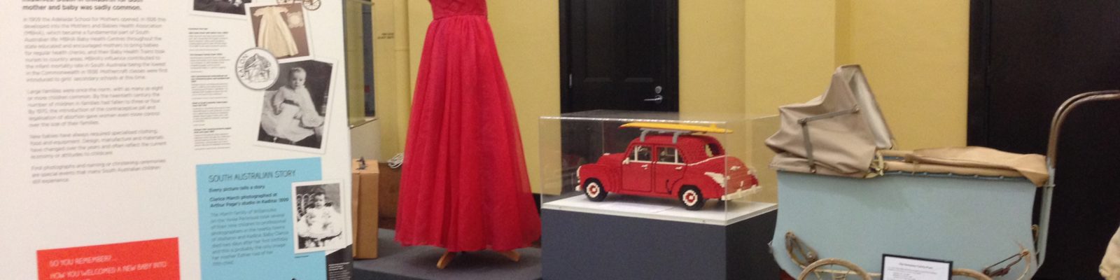 Display of items including a red dress