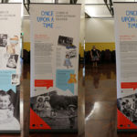 Collage of three banners showing text and images in a large hall.